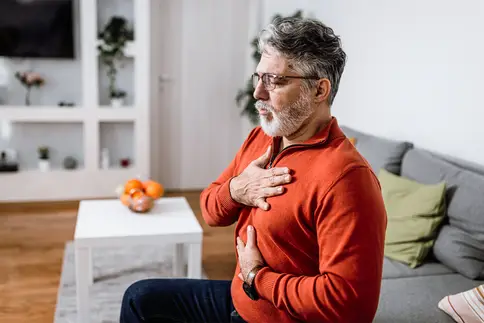photo of man having pain in chest