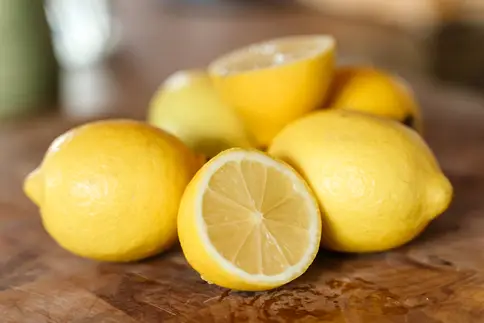 photo of sliced lemon on cutting board
