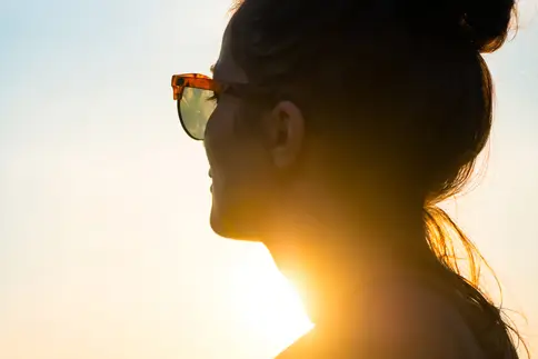 photo of woman wearing sunglasses