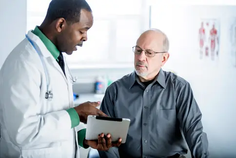 photo of doctor patient consultation