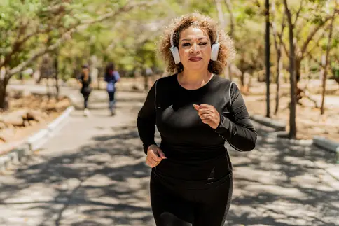 photo of woman walking outside