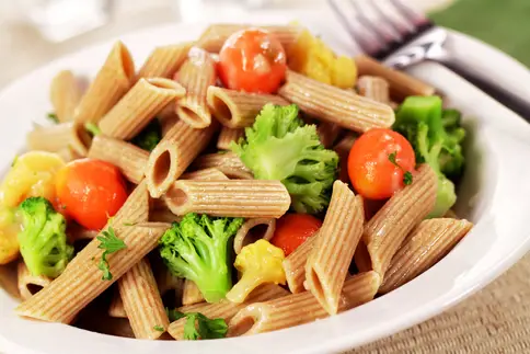 photo of whole wheat pasta and vegetables