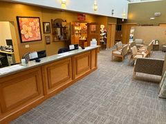 Inside view of the patient check-in and lobby of Helendale Dermatology And Medical Spa