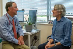 Dr. Christopher Duke with a patient at Complete Concierge Care