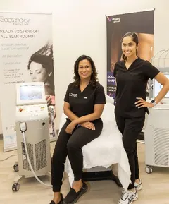 Dr. Nimalie Rodrigo along with a team member at Revitalize BodyMD