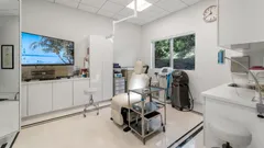 Inside view of a patient examination room at Feel Beautiful Plastic Surgery