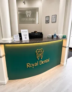 Upon entering the clinic, you'll be welcomed by the front desk staff at the Royal Dental Center.