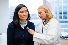 Dr. Ana Paunovic with a patient at Complete Concierge Care