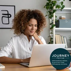 Patient attending a virtual psychiatry appointment on a laptop for anxiety, depression, and medication management services across Missouri.