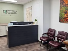 The front desk and waiting room at Progressive Primary Care