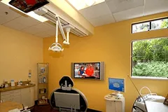 Rooms feature ceiling and wall-mounted TVs, bright and sunny windows, and state-of-the-art equipment for your dental care needs.