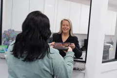 Office staff greeting patient at Tennessee Valley Oral Surgery.
