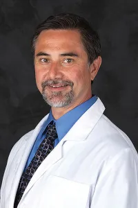 John M. Crisologo