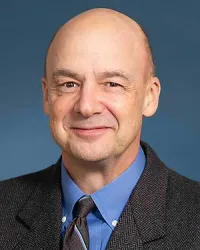 William E Traverse