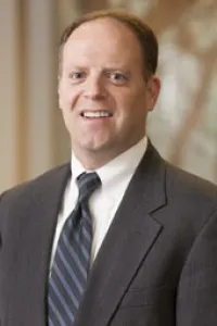 Daniel E Greenan