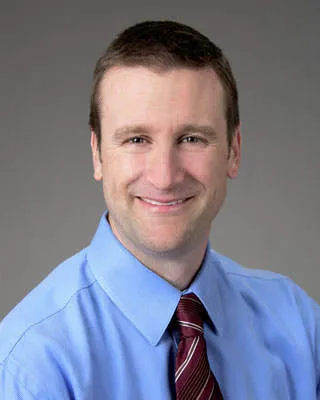 Andrew D Ferguson