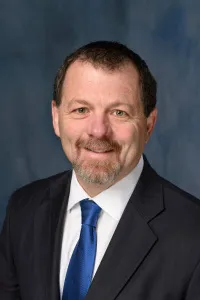 Glenn E Smith