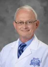 Gregory C Mahr