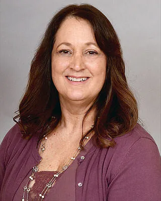 Sandra J Duggan