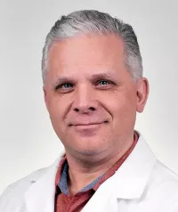 Andrew T Winand