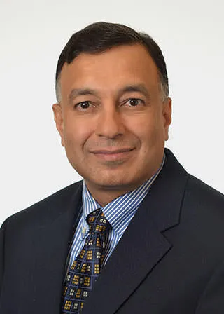Sunil J Juthani