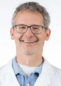 Andrew J Maxwell
