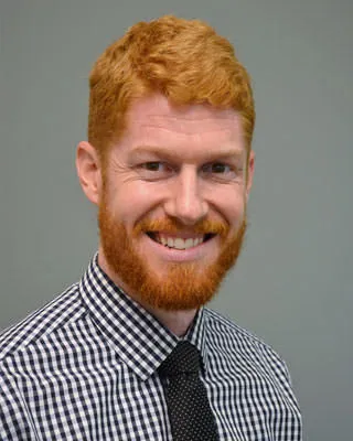 Kevin J Miller