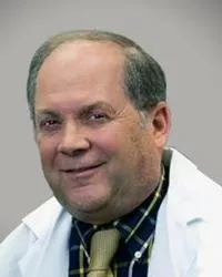 Alan J Briker