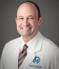 Jonathan B Cohen