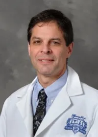Eric J Scher