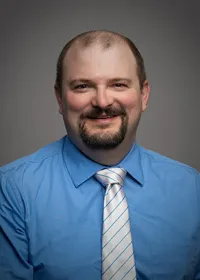 Nicholas J Antos