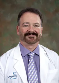 Derek R. Holmes