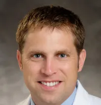 Christopher M Dodgion