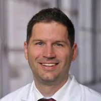 Joshua W Evans