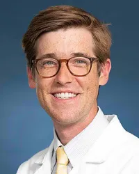 Aaron K Remenschneider