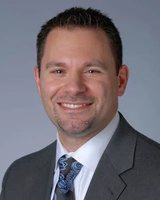 Joshua M Adkinson