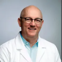 Mark L. Dake