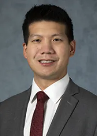Dennis M Tang