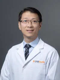Christopher D Kim