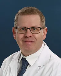 Kevin J Mills