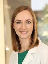 Laura K Miller