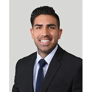 Dr. Christian John Lami