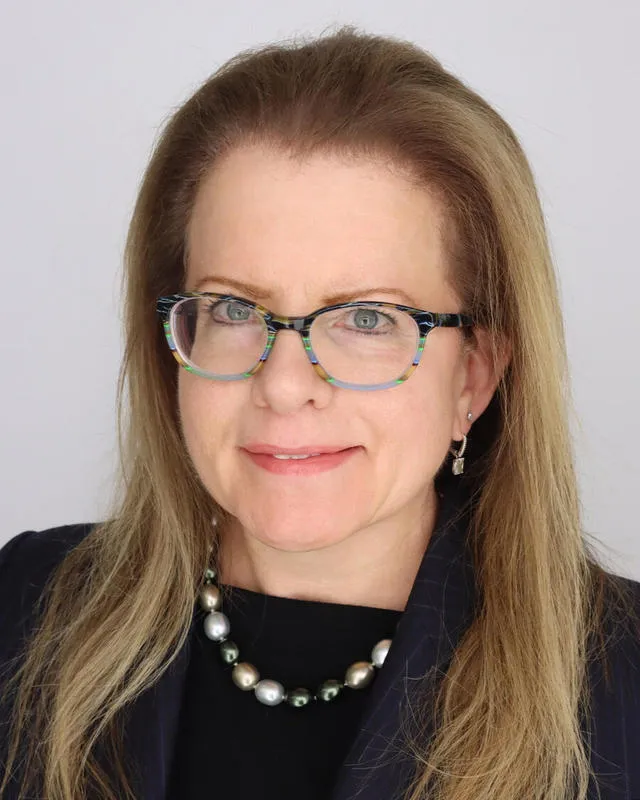 Tina J Hieken