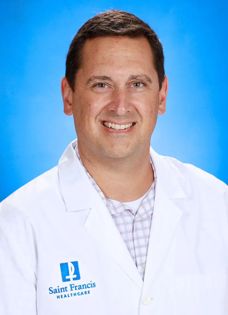 Adam M Cox