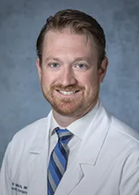 John M Garlich