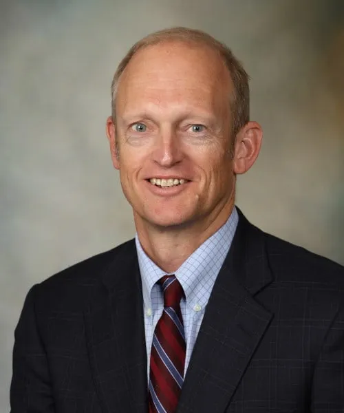 John M Knudsen