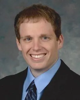 Andrew T Daluga
