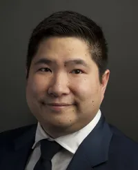 Anthony C Tam