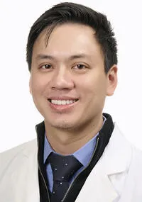 Aaron L Tang