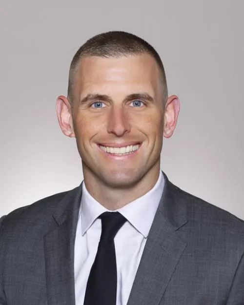 Travis L. Hughes